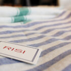 telo mare in lino con righe alternate modello Edoardo Risi Milano